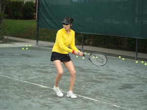 lily_ho Lily Ho works on her backhand at a Nick Bollettieri Tennis Academy adult camp