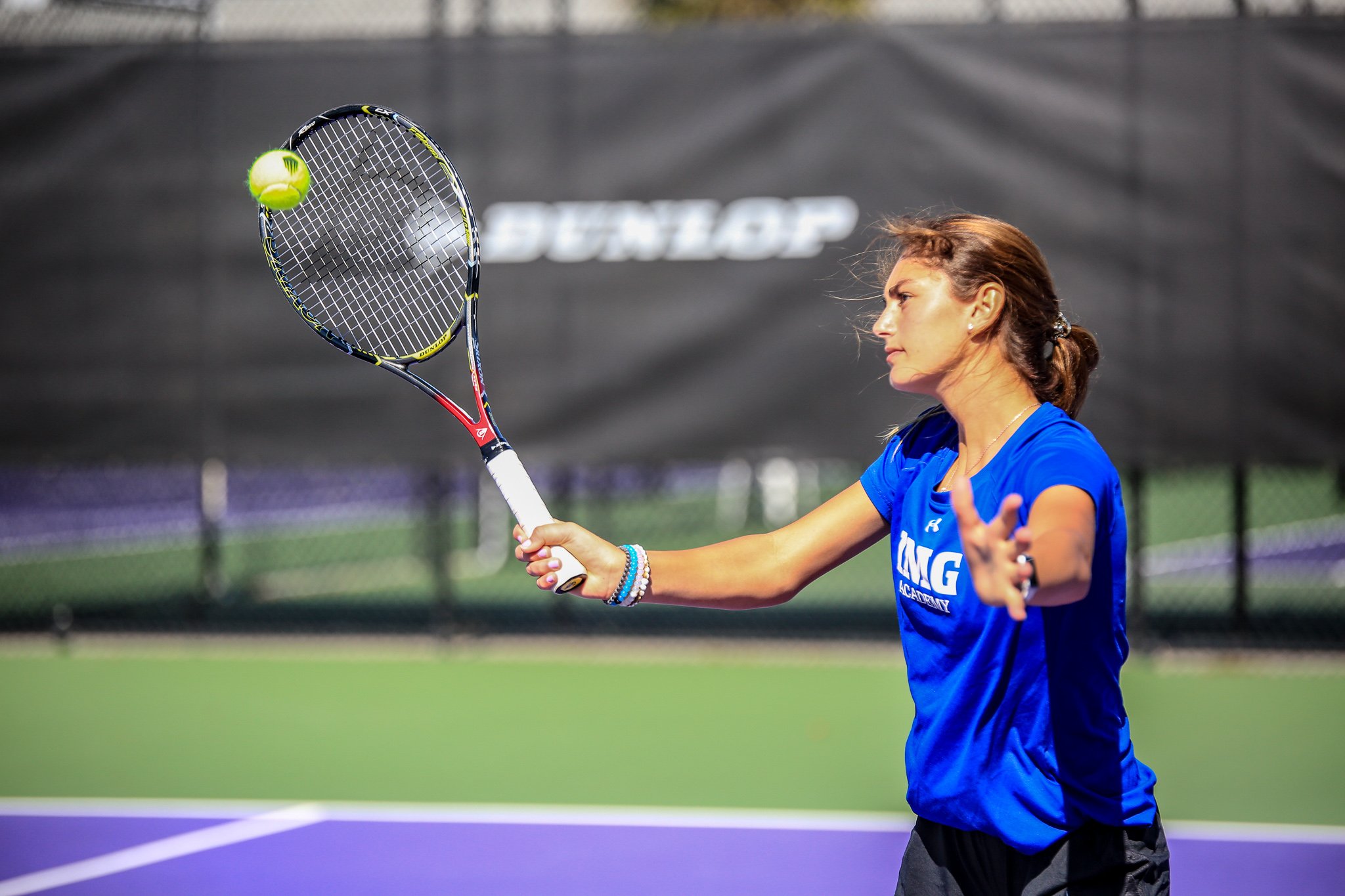 Girl hitting a tennis shot at IMG Academy | IMG Academy