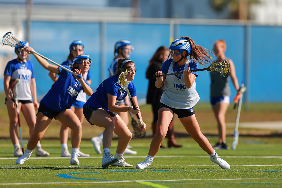 female lacrosse players practice at IMG Academy