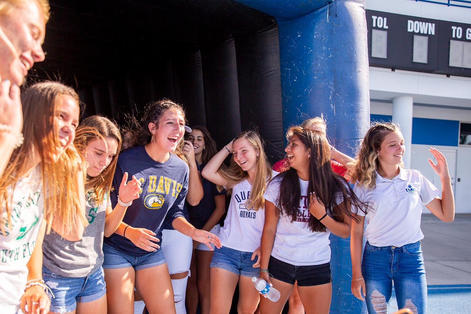 IMG Academy student athletes celebrating on IMG Academy football field