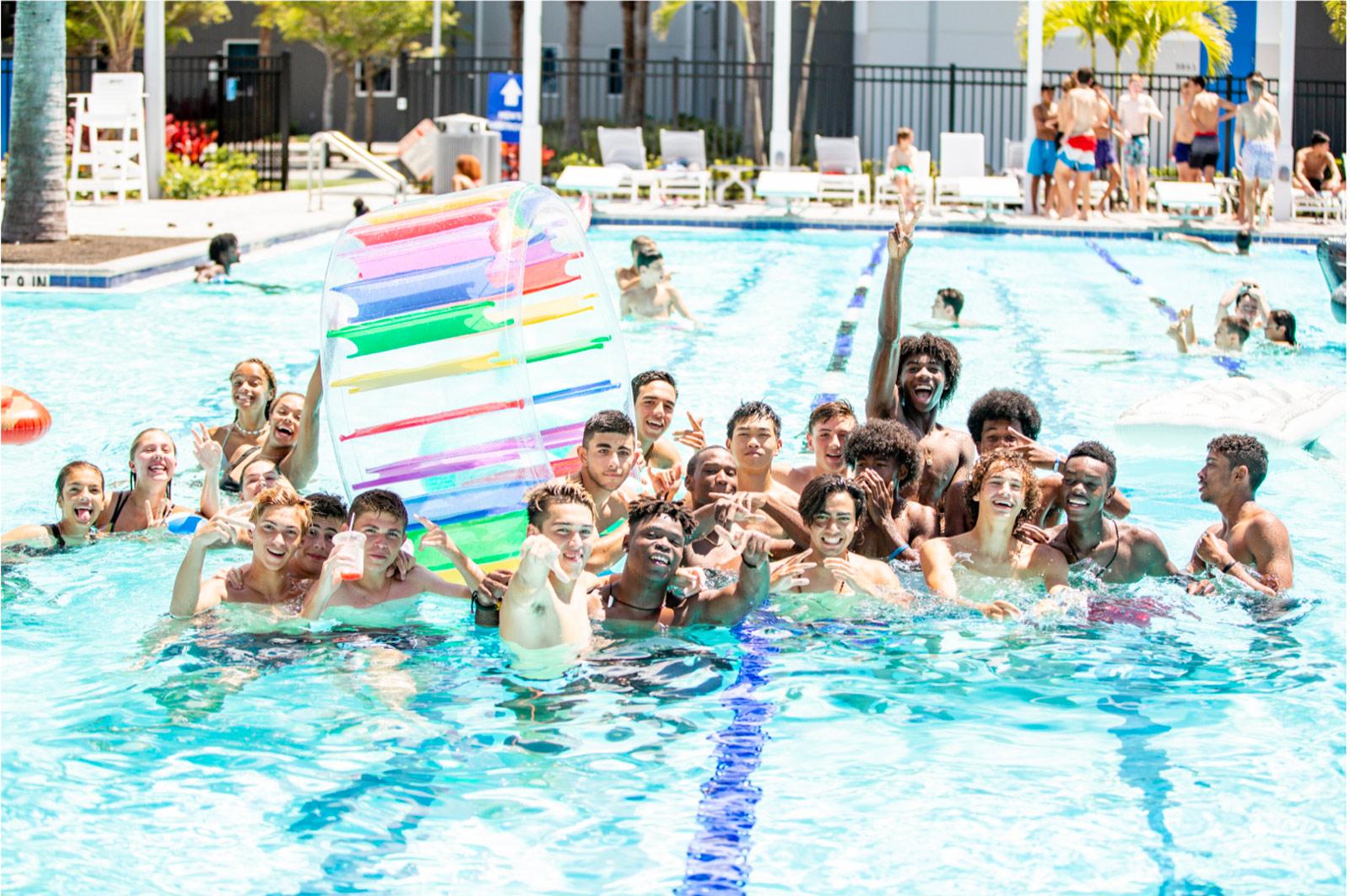 IMG Academy campers relaxing in the pool