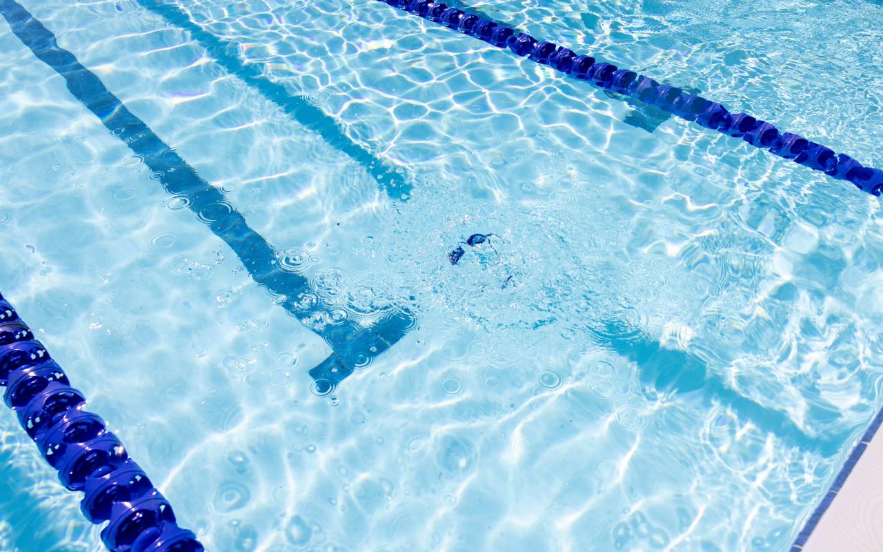 overhead shot of an indoor athletic swimming pool