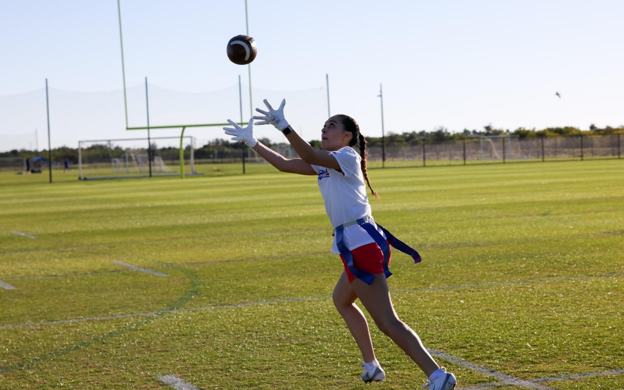Girl Playing Flag Football