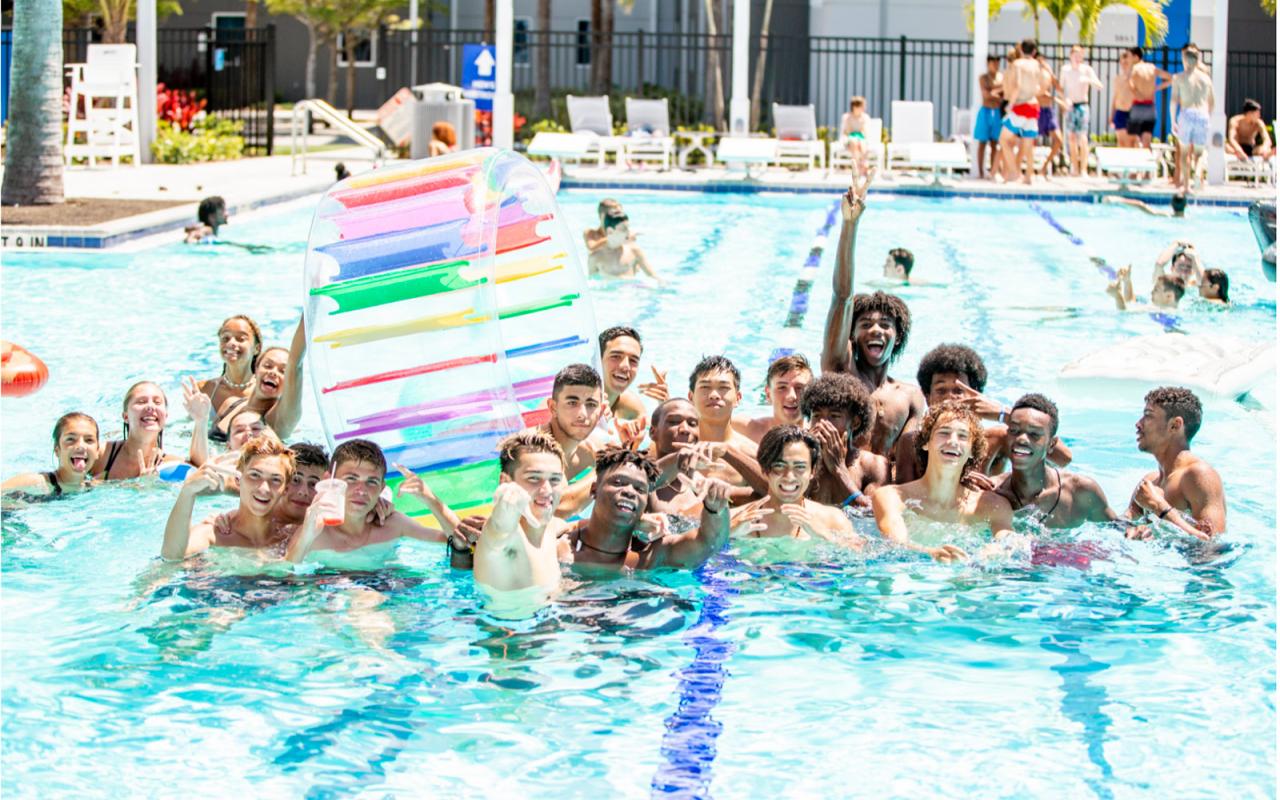 IMG Academy campers hanging out in the pool