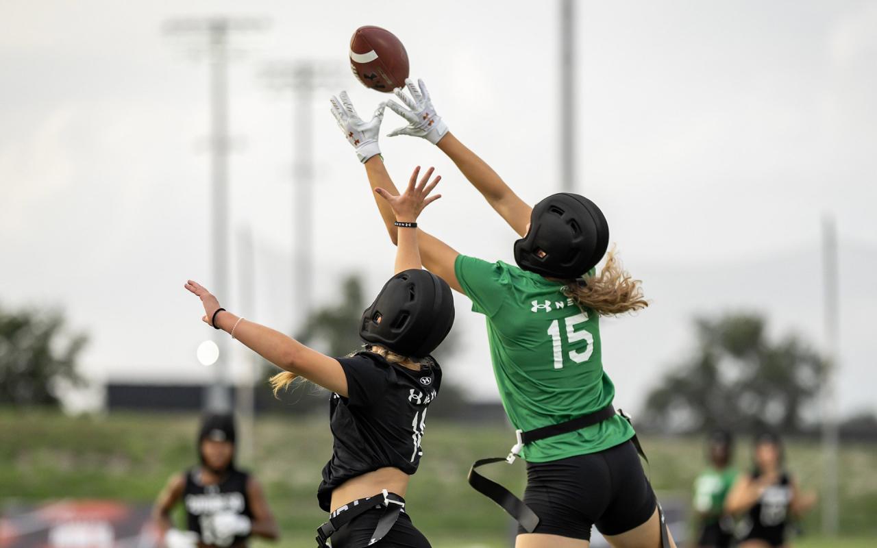 Two Girls Playing Flag Football