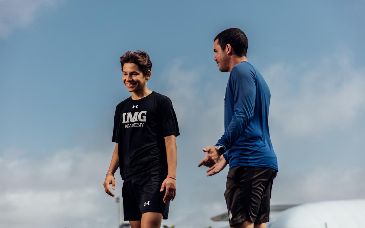 Coach with Camper at IMG Academy